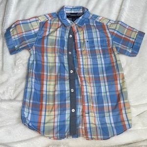 Button down plaid shirt sleeve